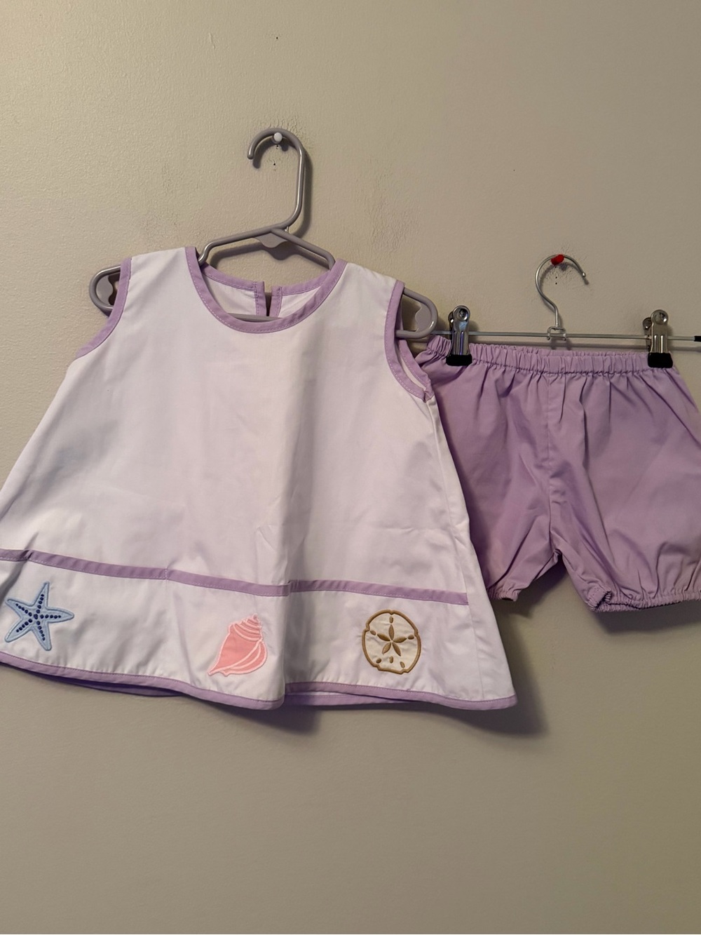 The Beaufort Bonnet Company Two-Piece White & Lilac Sea Shell Appliqué Set
